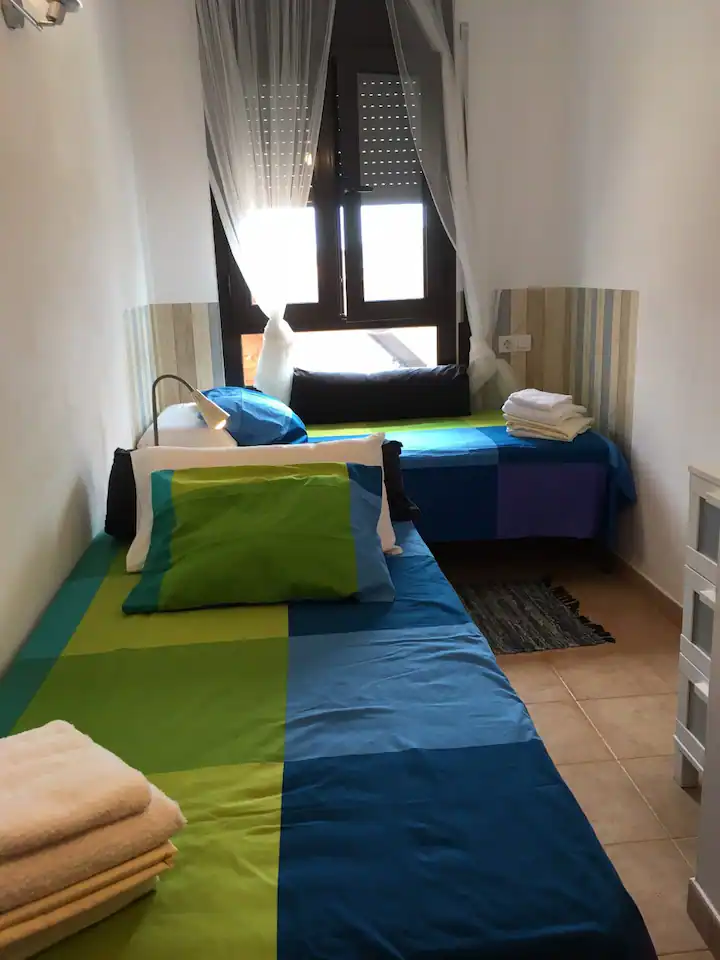 Twin bedroom perfect for kids, bright and cheerful