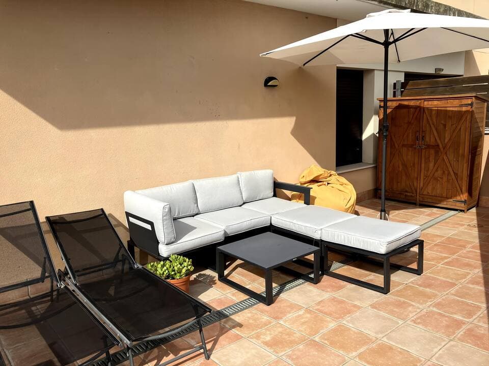 Full view of the private terrace with outdoor lounge area